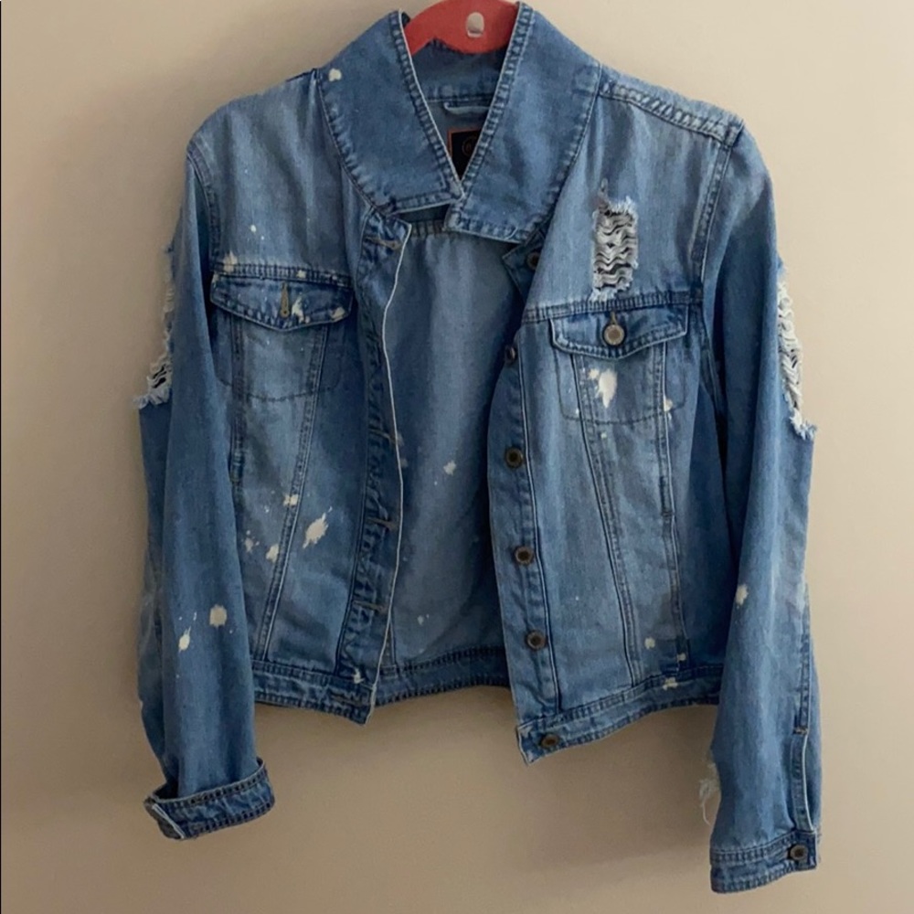 Jean jacket with splattered white paint